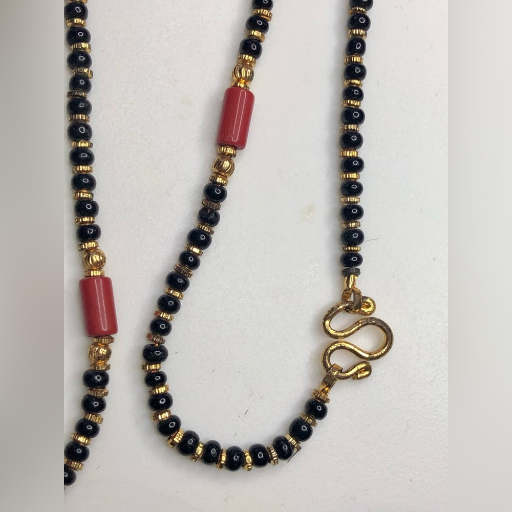Necklace black beaded specks of gold chain 15’